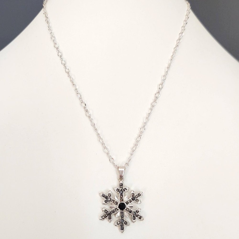Silver snowflake with black and gray crystals pendant necklace
